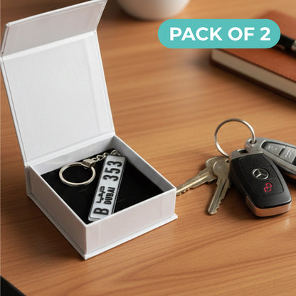 سلسلة مفاتيح برقم السيارة - علبتان - هدية فخمة ومخصصة لعشاق السيارات